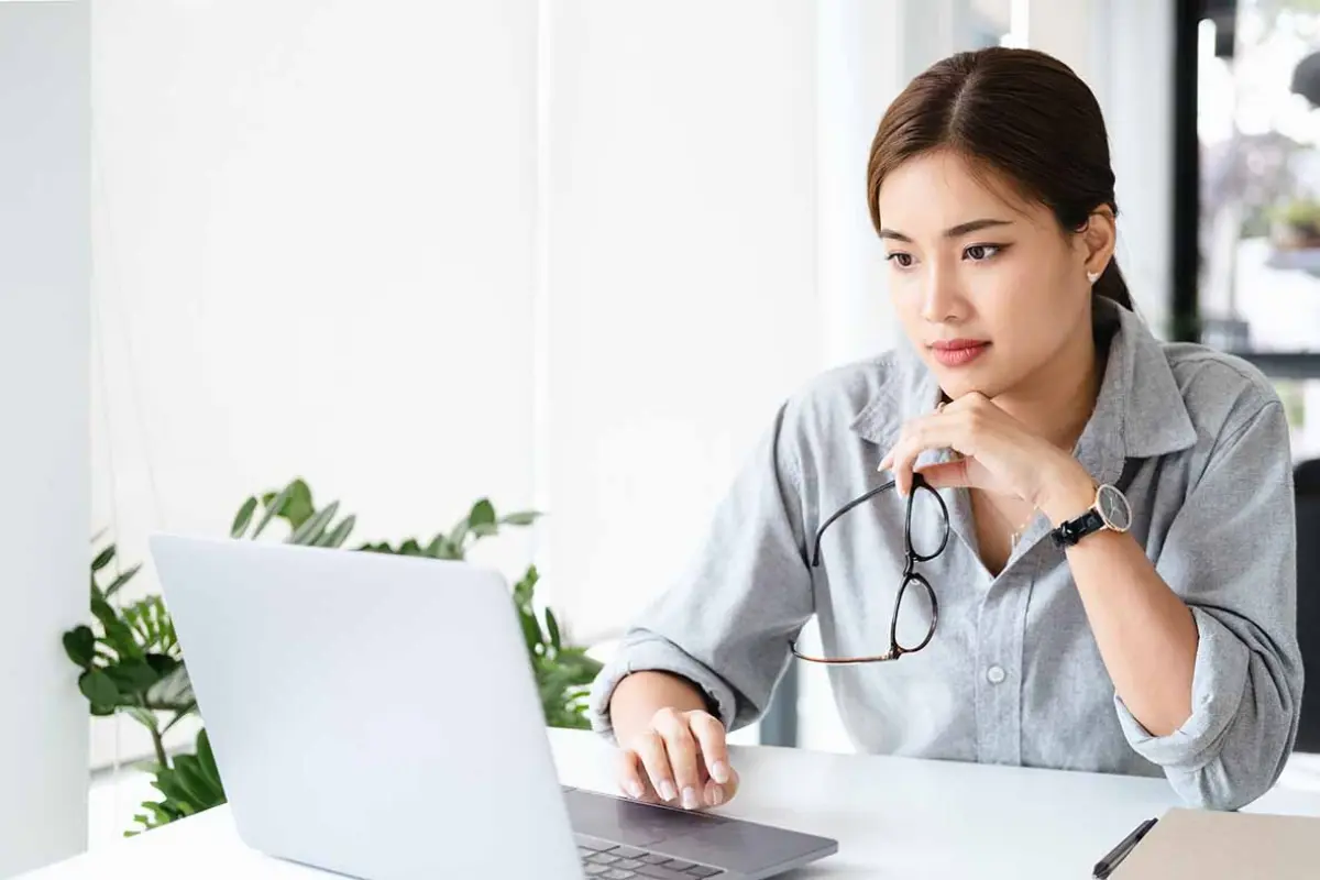 Business owner deciding between DBA vs LLC weighing benefits of DBA vs LLC including DBA vs LLC cost and DBA vs LLC taxes for small business.