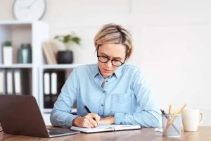 Small business owner deciding if forming an LLC is worth it for liability protection and business growth
